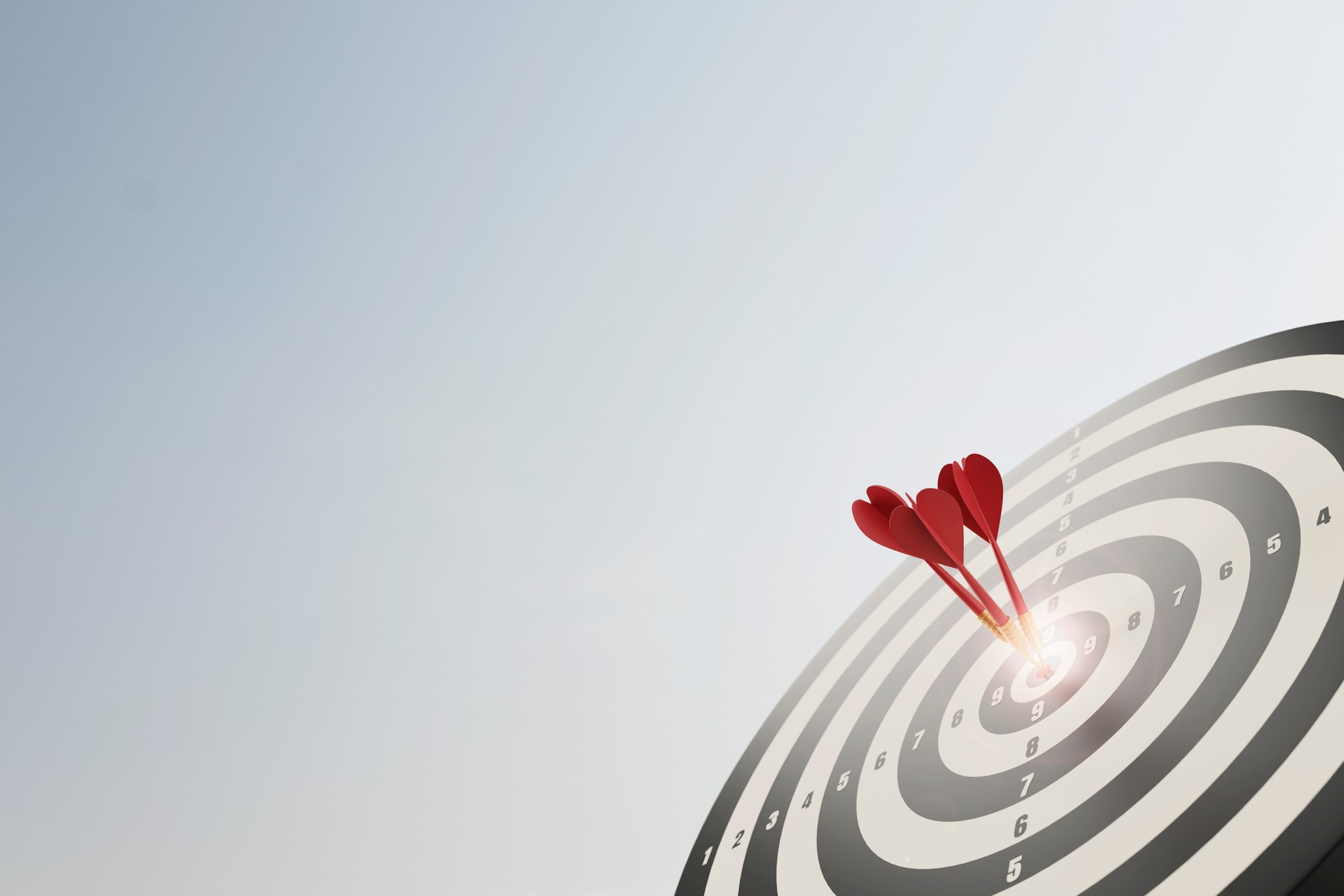 Red dart arrow in the center of dartboard on bullseye business success concept ,3d rendering